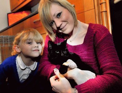 lucky escape: Amelia and Katie Shine are pleased to have their cat Darcy home